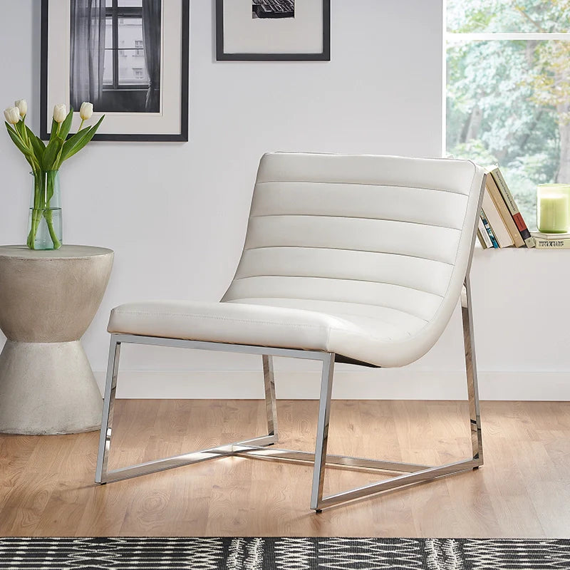 a white leather accent chair in a modern living area