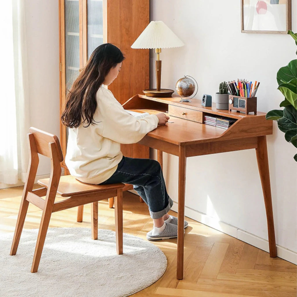 A sleek cherry wood desk with a hutch and single drawer, perfect for organizing your home office.