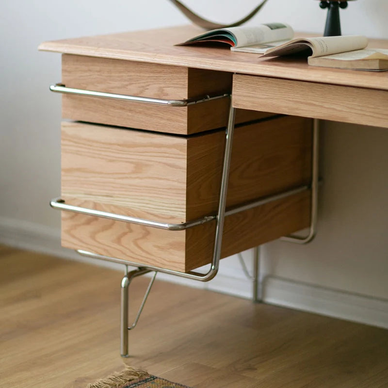 a natural wooden desk with drawers