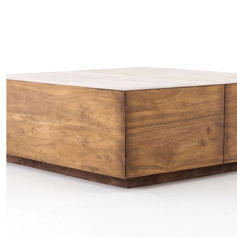 Up close view of square wood coffee table showing solid wood grain