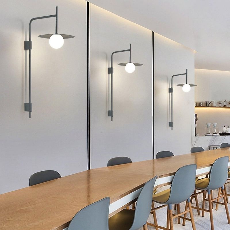 plug in wall lamps emitting light beautifully in a large dining area