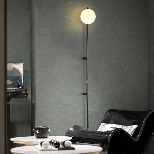 Plug in Wall Light fixture illuminating a dark decor theme living room 