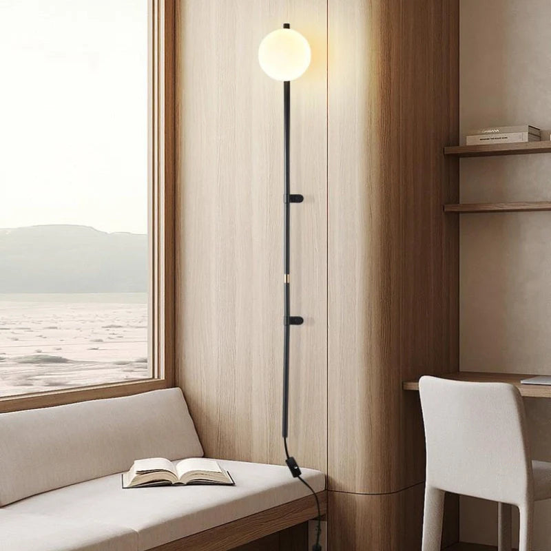 Modern Plug In Wall Light Fixture with LED Globe shade by a modern home work station