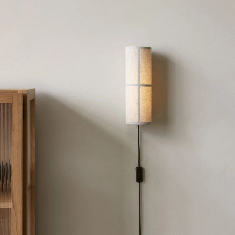 Plug in Variant of cylinder fabric wall sconce