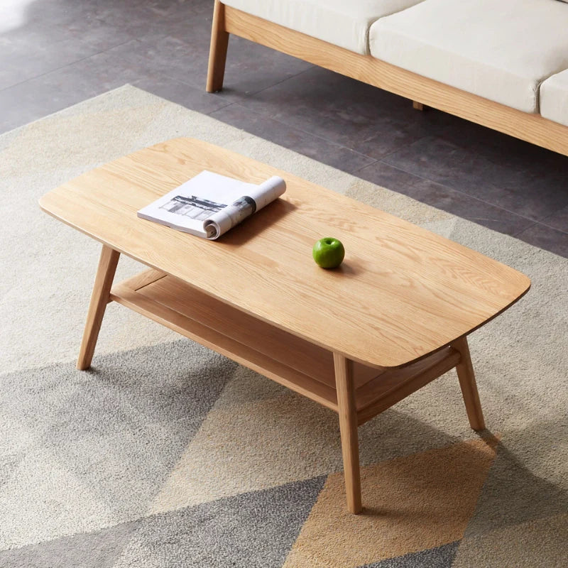 Top view of rectangular wood coffee table with open shelf in natural wood color