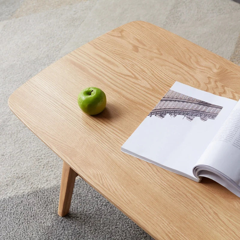 Up close view of the modern wood coffee table top showing beautiful wood grain finish