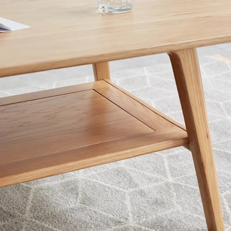 Up close view of the Modern wood coffee table highlighting shelving