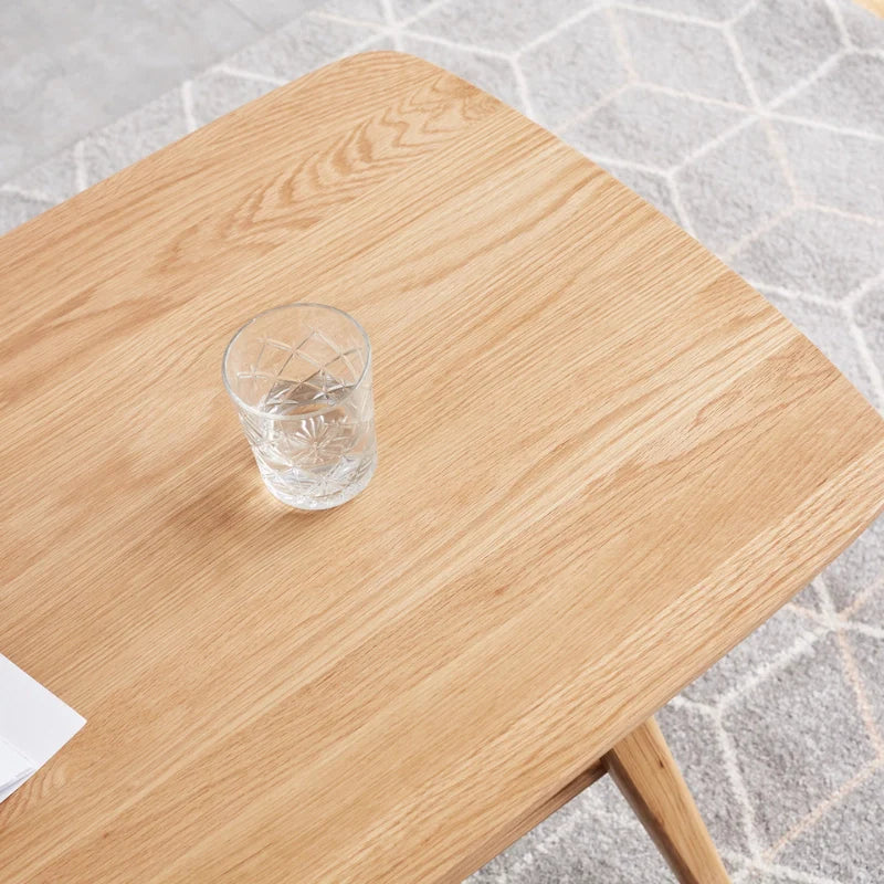 Up close view of the modern wood coffee table top showing beautiful wood grain finish