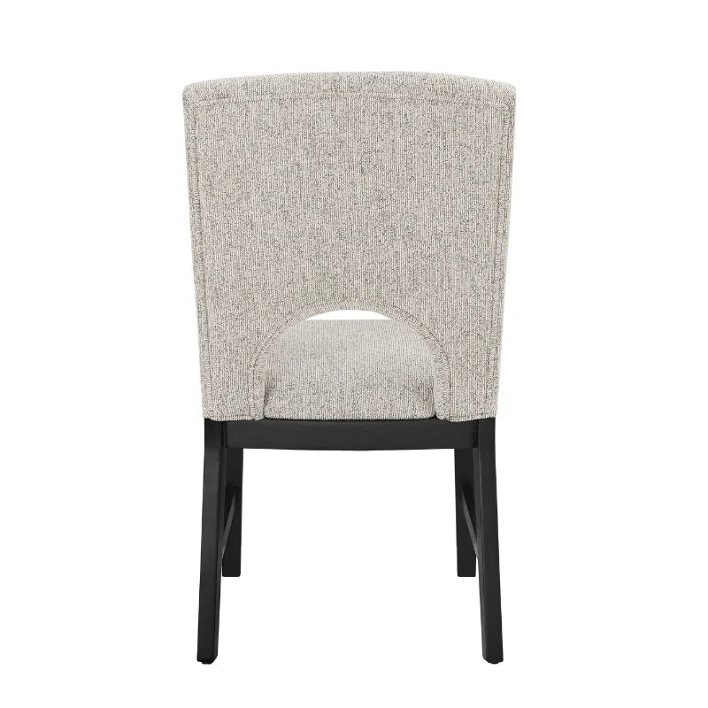 Back View of single upholstered dining chair of round wood dining table set