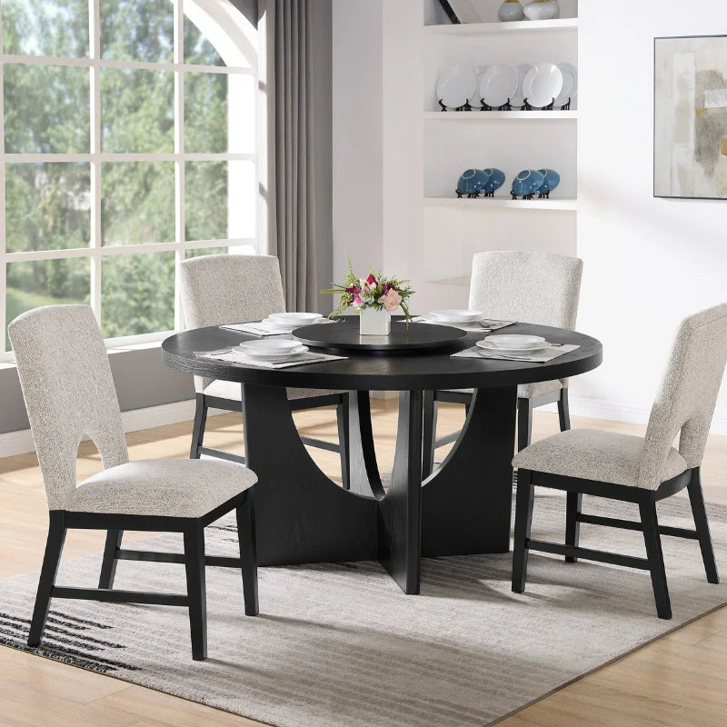 Round wood dining table set of 4 in a modern dining room setting