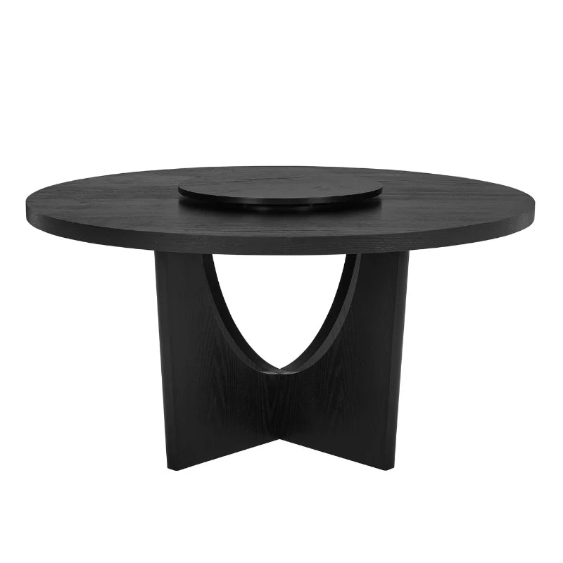 Round wood dining table highlighting its stylish pedestal and lazy suzan feature