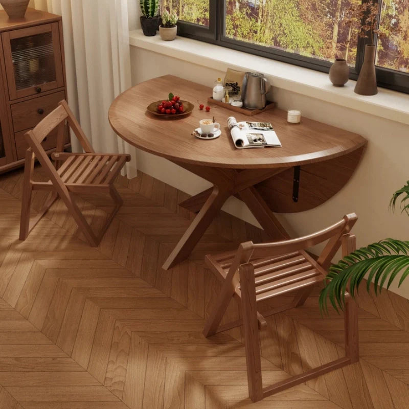 an extendable solid wood dining table in a living area.