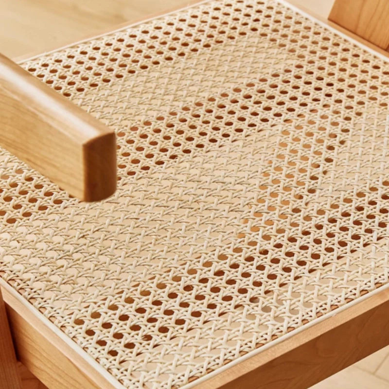 A Rattan Dining Chair Showcasing the Rattan Woven Seat 