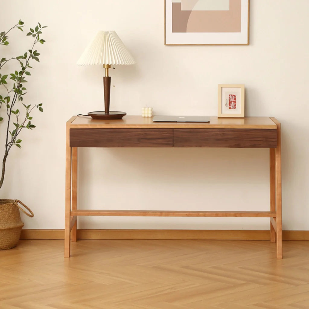 a solid wood desk with two large drawers in a walnut finish