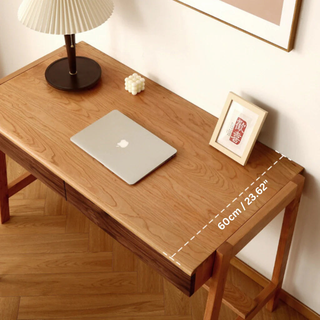 a wooden desk with drawers, providing ample storage for modern workspaces.