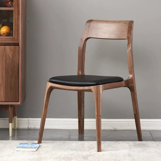 Wood dining chair with pu leather seat in a modern living space 