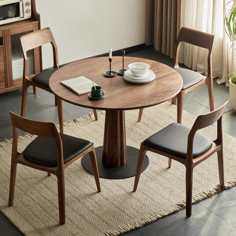 A Wood Pedestal Dining Table with Sintered Stone Top with 4 Matching Dining Chairs