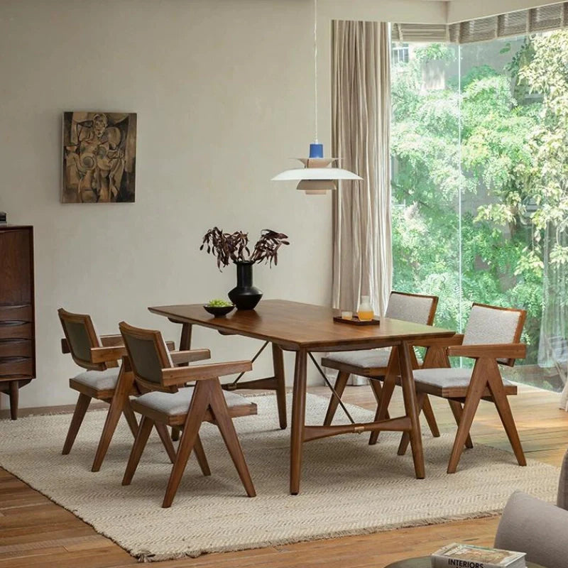 Rattan Dining Chairs placed around a Wooden Dining Table