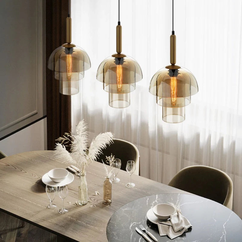 a kitchen pendant light over a dining table