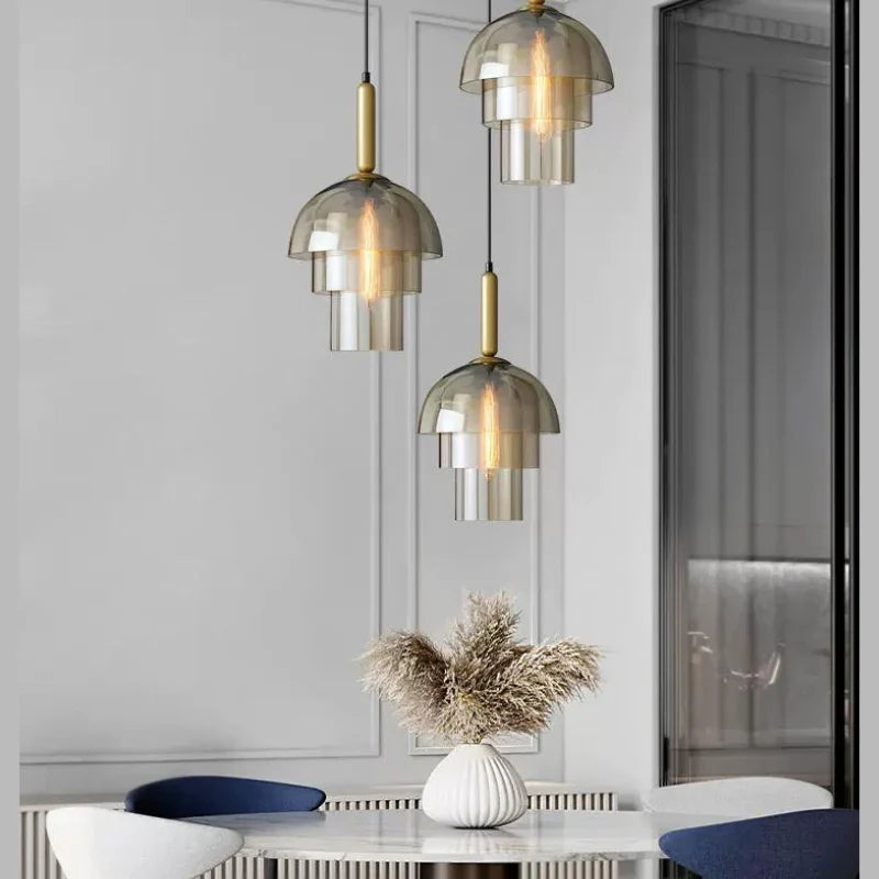 kitchen island pendant lights hung beautifuuly in a modern setting