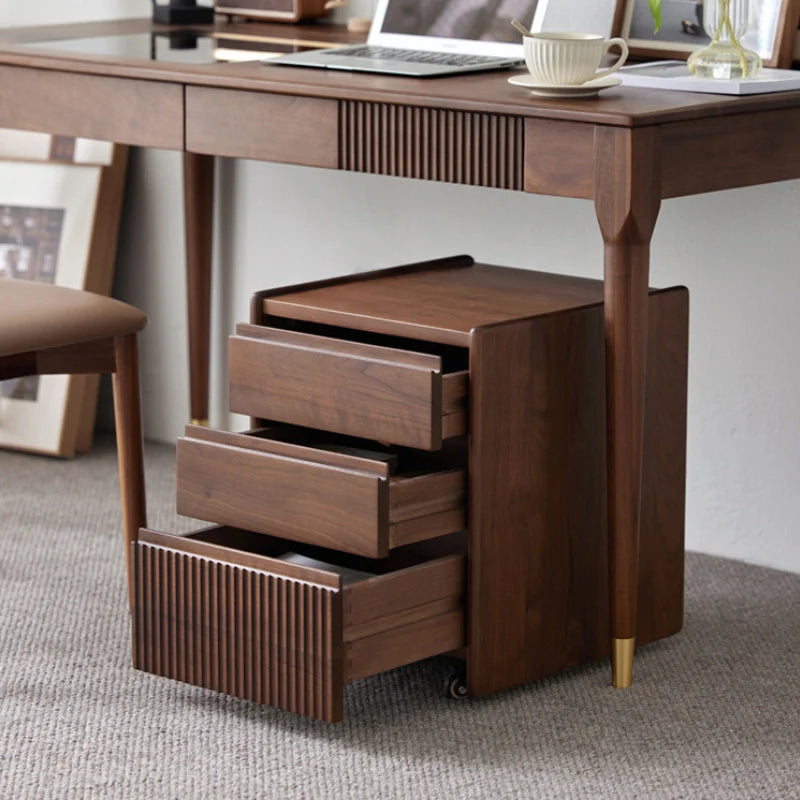 a walnut wood desk with a rolling cabinet that features three drawers