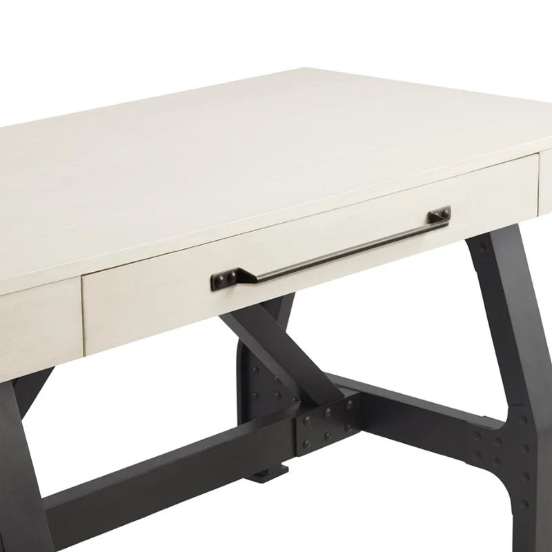 Up close view of the white wood desk with drawer showing metal handle, black wood legs and white wood top