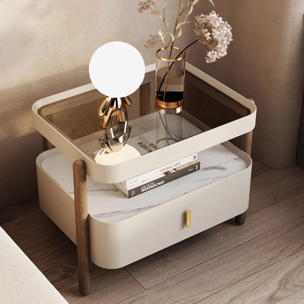 An image of a wood nightstand with a modern design featuring a sintered stone and glass top, a solid pine wood frame, a glossy lacquer drawer, and an open shelf for versatile storage, available in Alabaster Cream, Mocha Brown, Olive Sage, and Chestnut Bronze finishes.