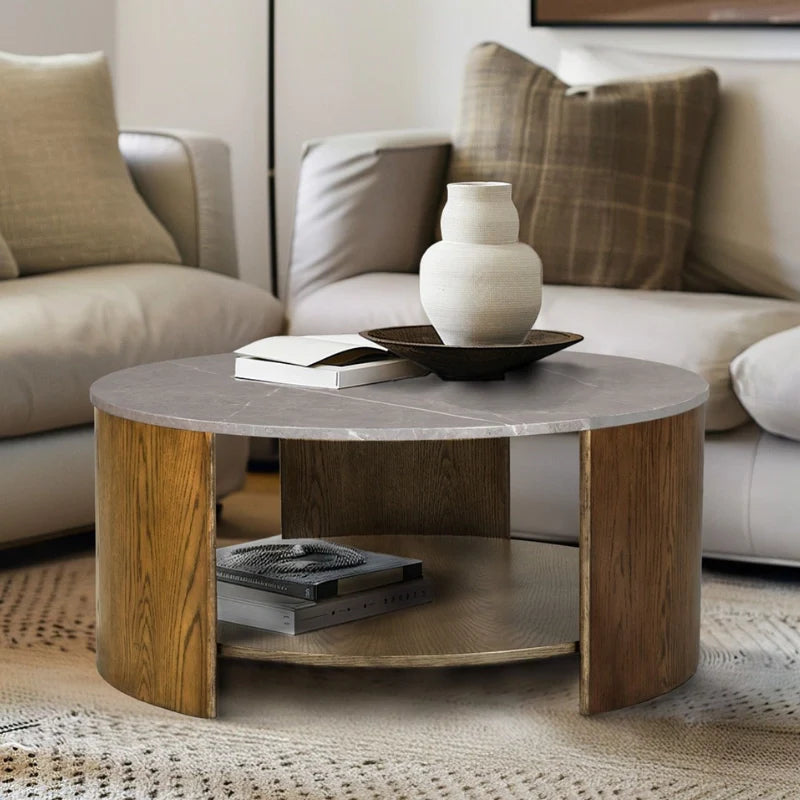 Wood Round Coffee Table with faux marble table top in oak color in a modern living room setting