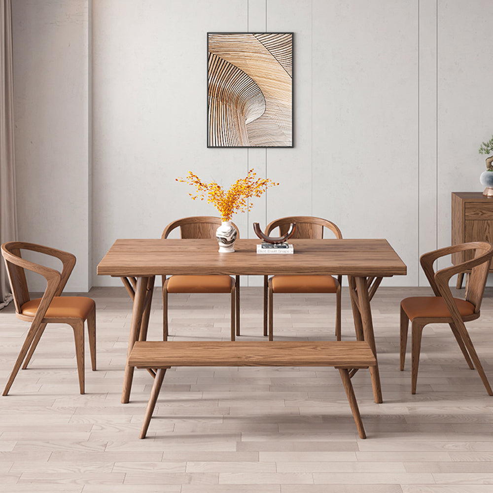 Wood Rectangle Dining Table with Dining Chairs and bench in a spacious dining area