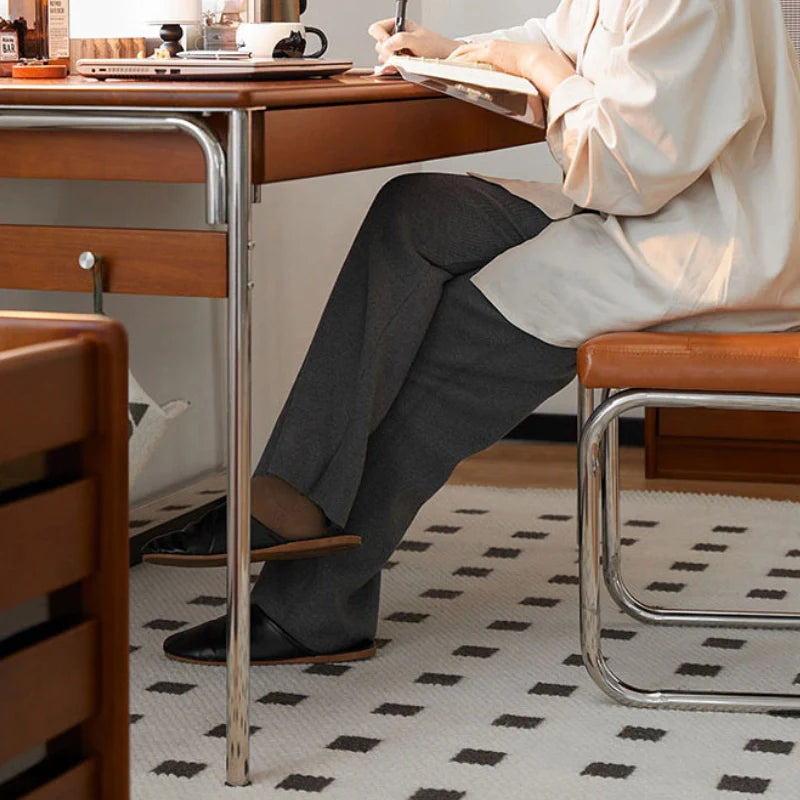 Spacious leg room of Mid-century modern desk in a comfortable home office setting