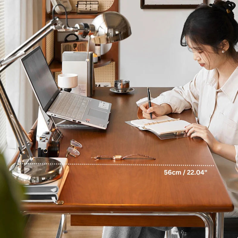 56cm Spacious table top of Wood and metal desk in a comfortable home office setting