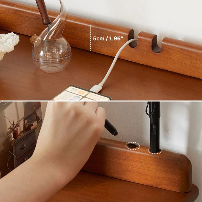 Pen holding features and cable management grooves of wood and metal desk in a comfortable home office setting