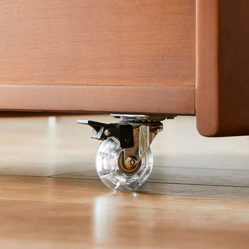 Rolling wheels of three tier drawer of wood and metal desk