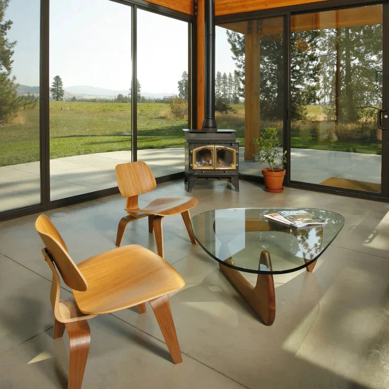 Brown variant of glass wood coffee table complementing surrounding decor