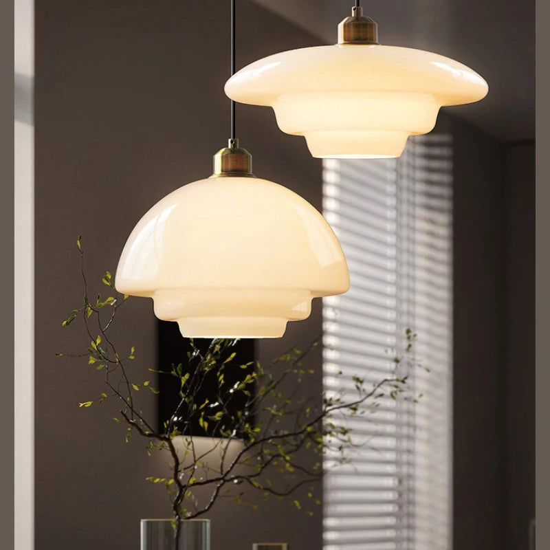 a glass pendant light for kitchen island in different shapes