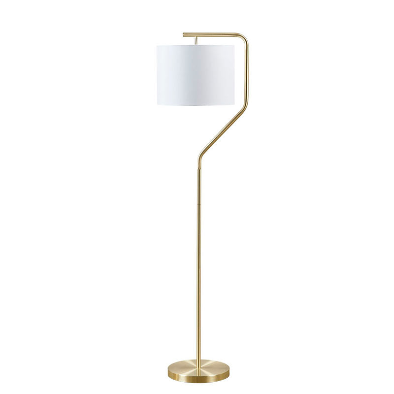 a modern gold floor lamp in a white background