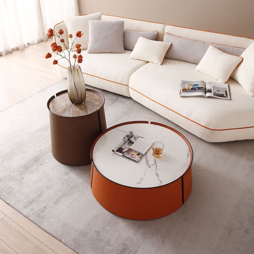 s coffee tables  with flower vase and sofa in a living room