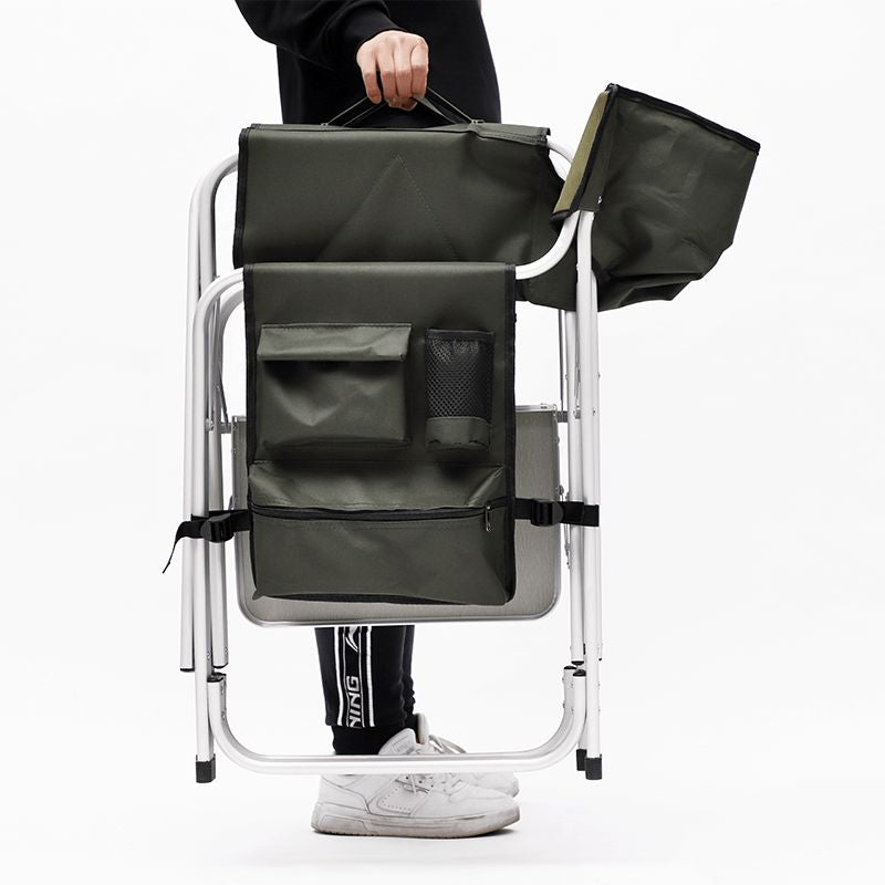 An image of a man carrying the folded chair 