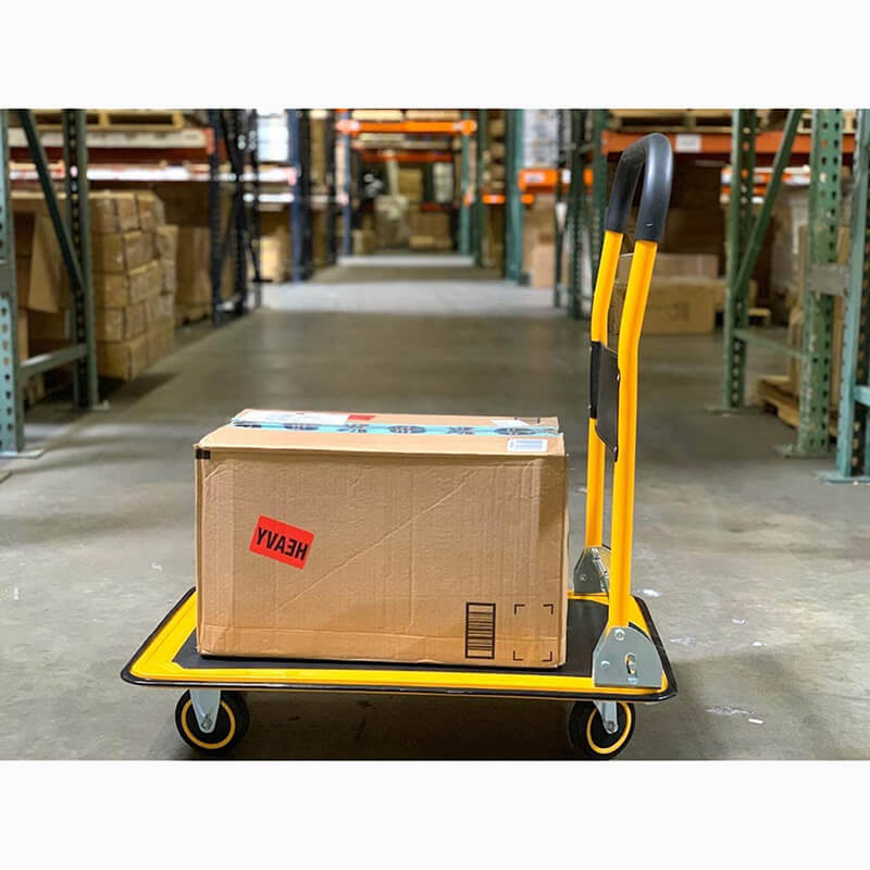 Truck with a carton in a warehouse ready to be moved 