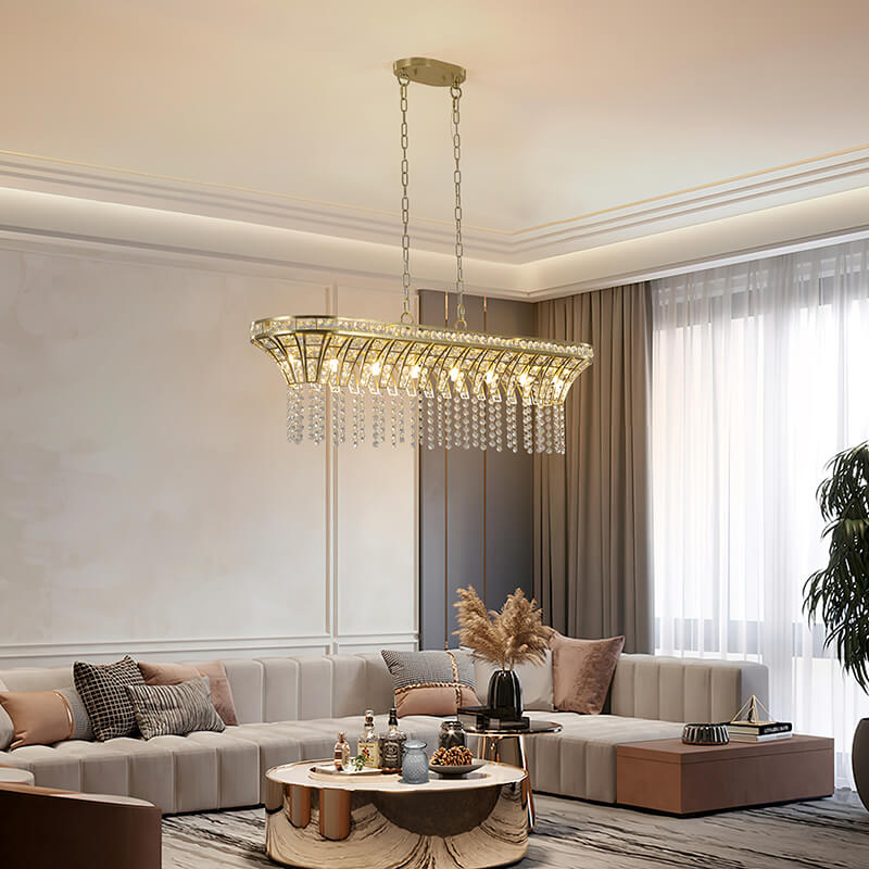 Island chandelier hanging over a modern living room setting 