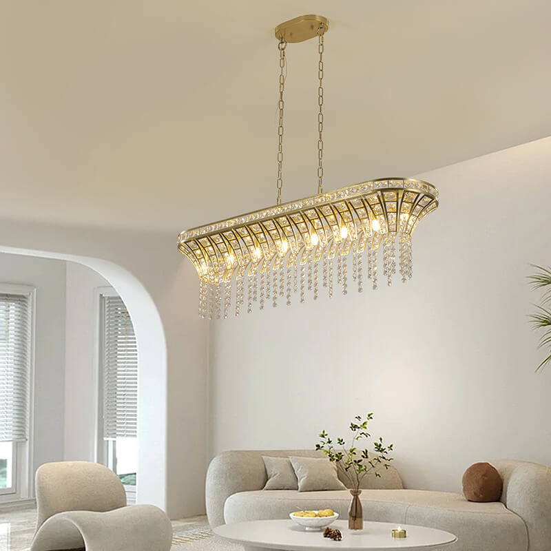 Island chandelier hanging over a modern living room setting 