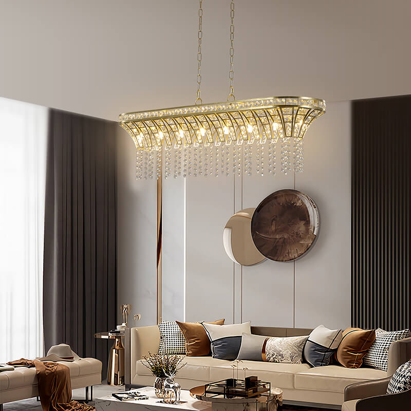 Island chandelier hanging over a modern living room setting 