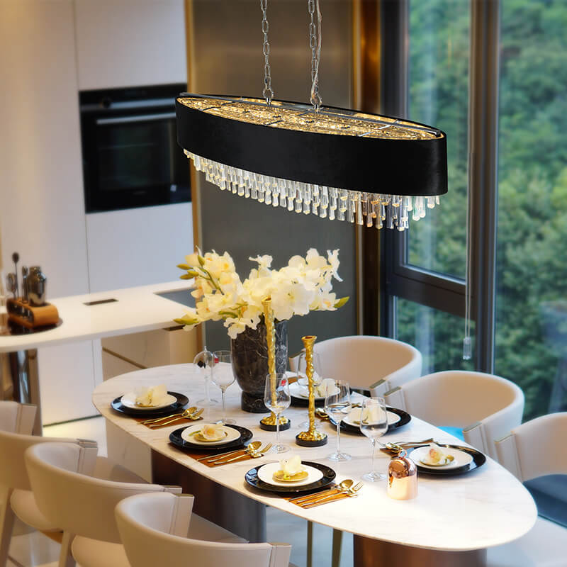 Crystal dining chandelier lighting a modern dining setting