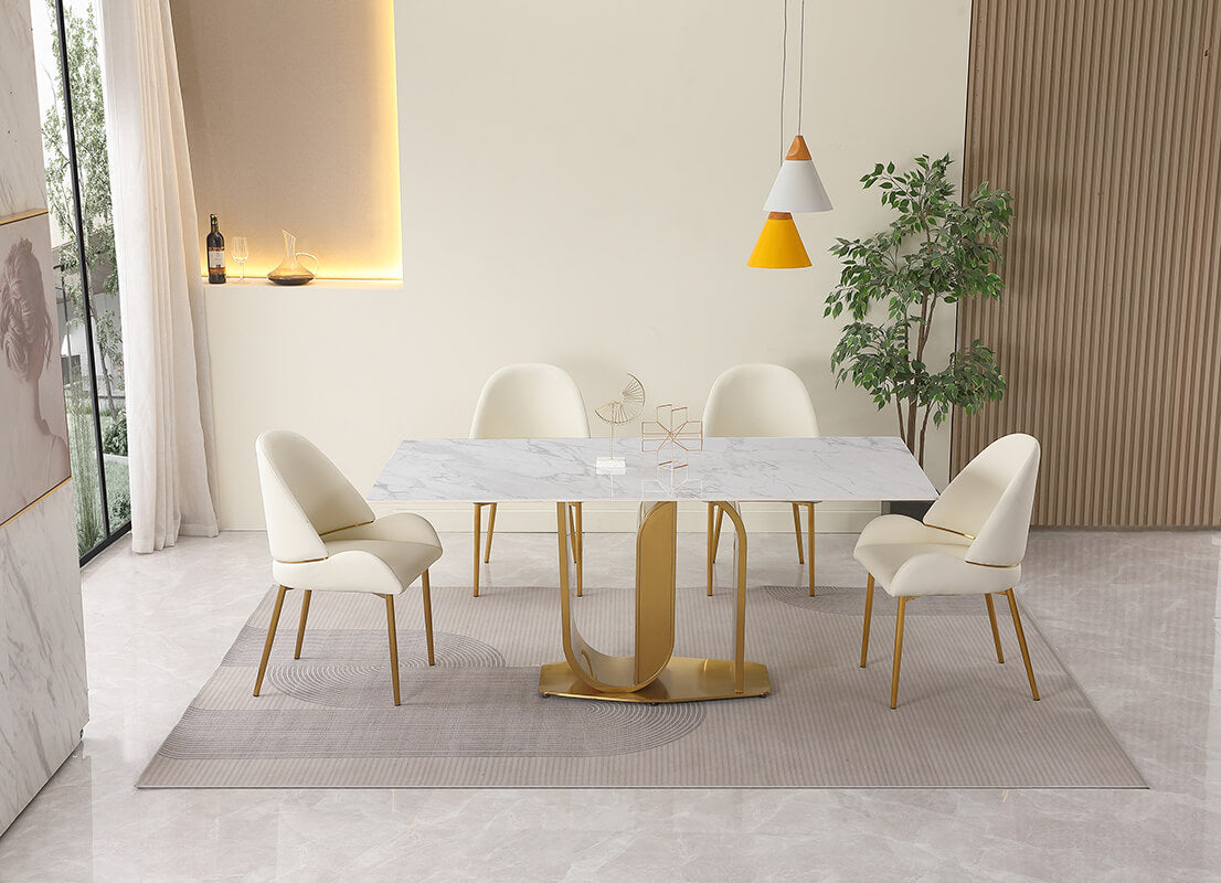 4 chairs arranged round the sintered stone table