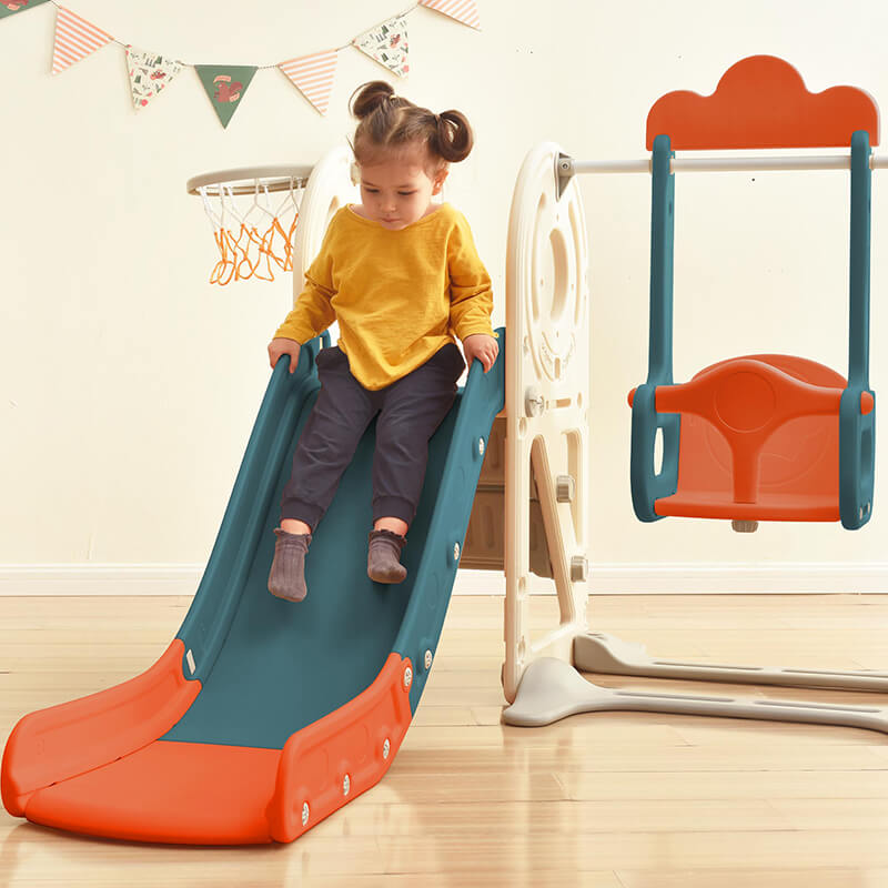 Kid playing swing and slide with Bus Structure and Basketball Hoop