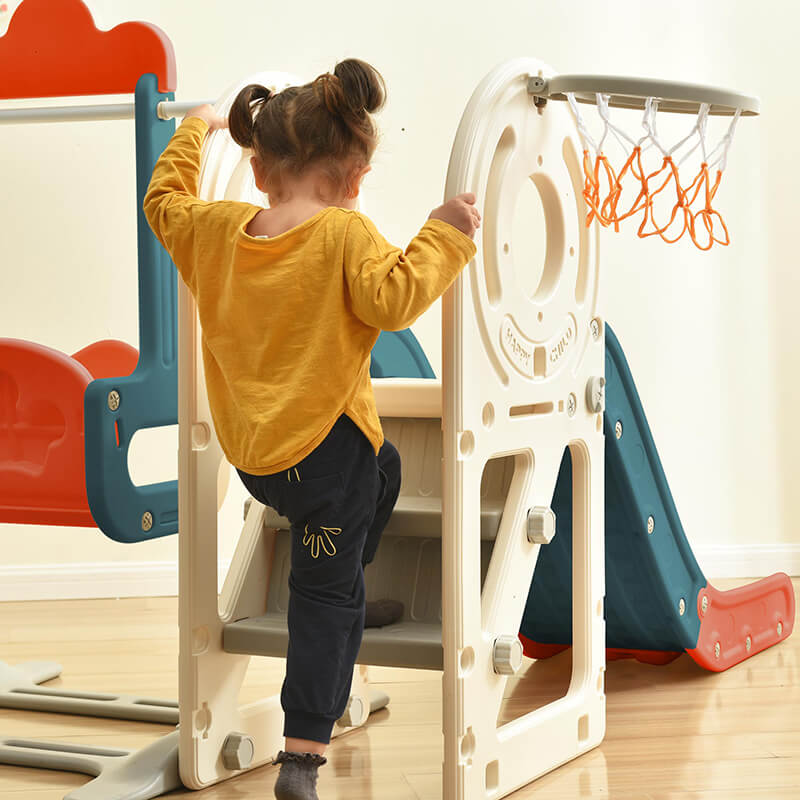 Kid playing swing and slide with Bus Structure and Basketball Hoop