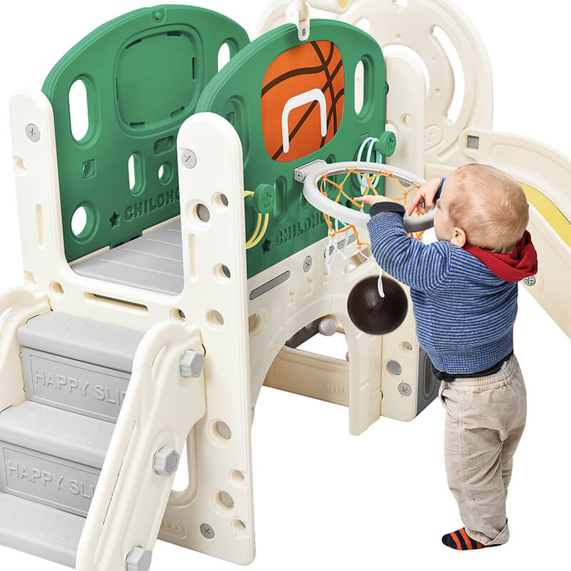 A kid playing with the basketball hoop