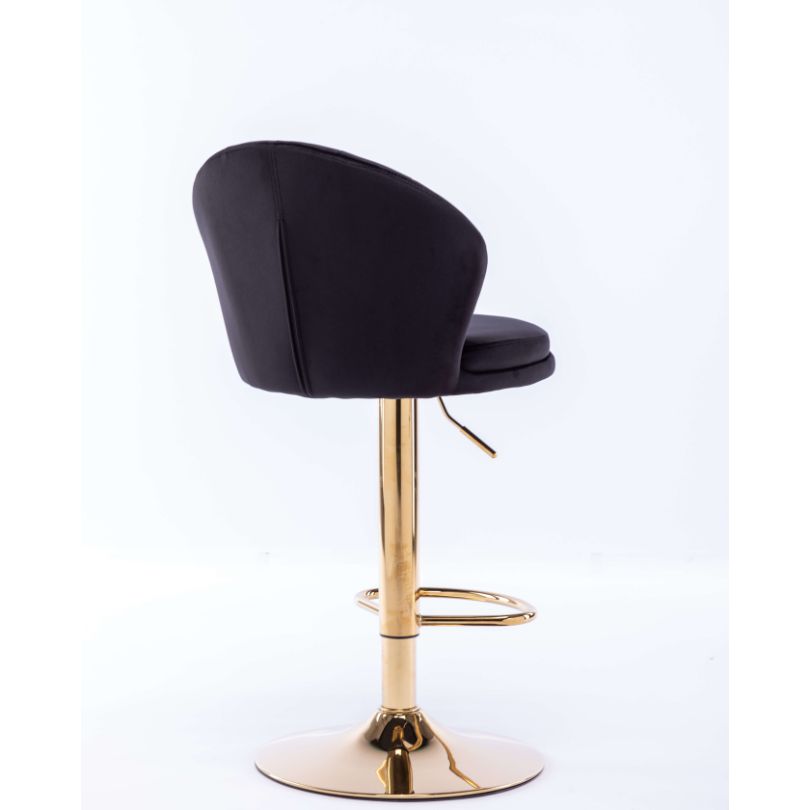 The back-view of A single Black Velvet Stool