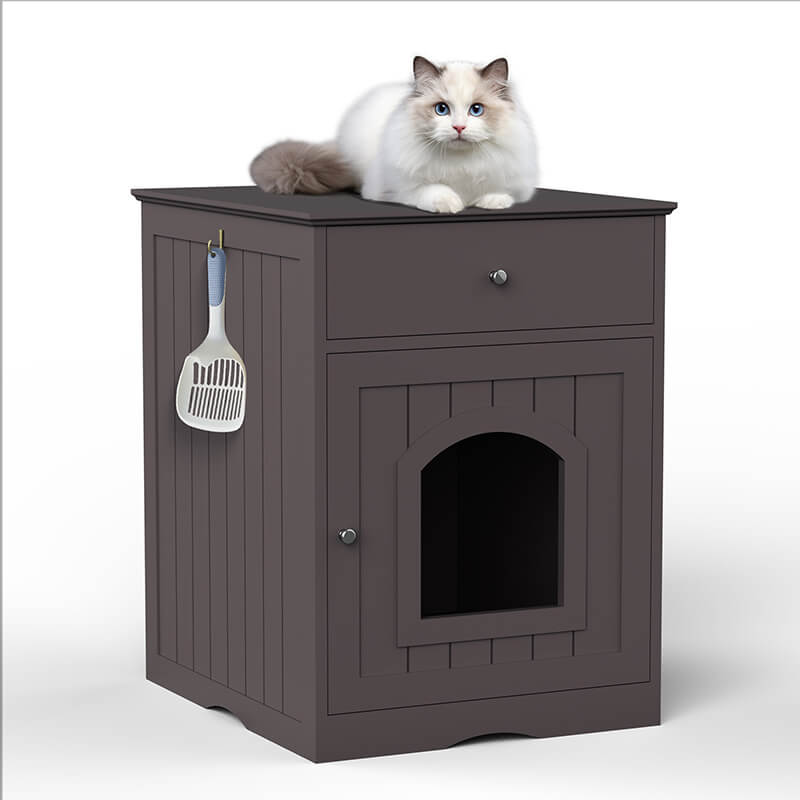 0A cat sitting on the top of a litter box and pet house 