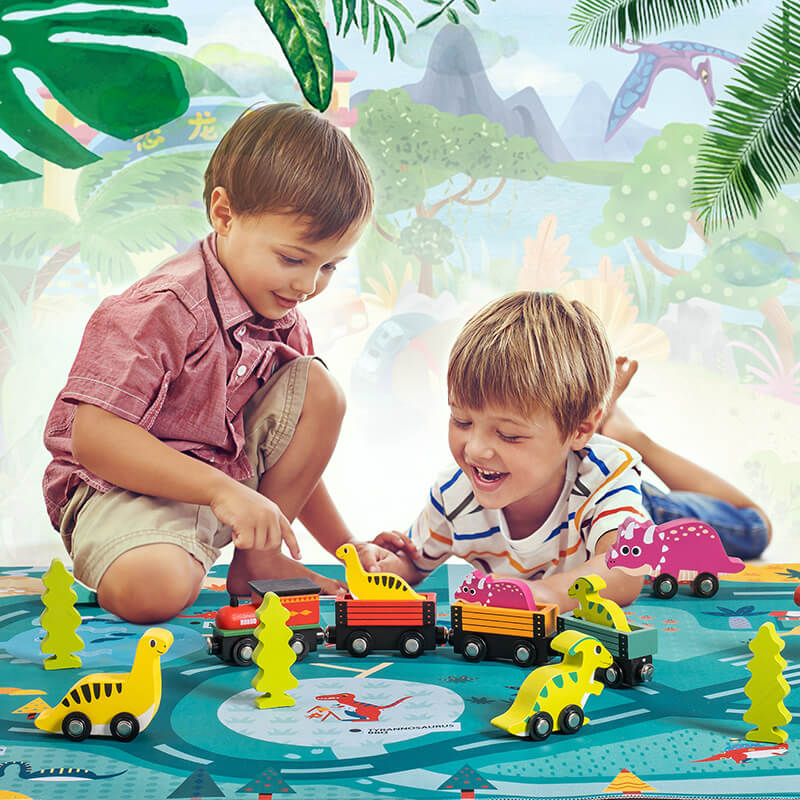 two kids playing with the playset